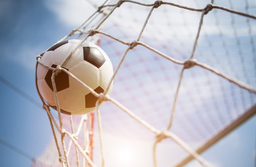 593SportsUS — Goal Kick in Soccer Net